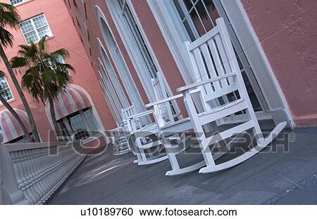 Stock Image - Rocking chairs on porch. Fotosearch
