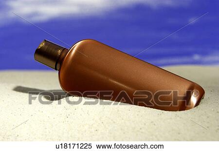 Suntan lotion on beach View Large Photo Image Stock Photography - Suntan lotion on beach. Fotosearch