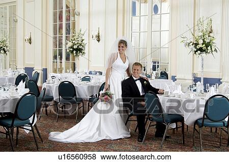 Bride and groom at reception View Large Photo Image Stock Photo - Bride and groom at reception. Fotosearch