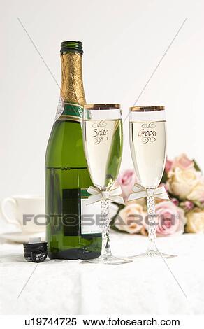 Stock Photography - Bride and groom champagne glasses. Fotosearch