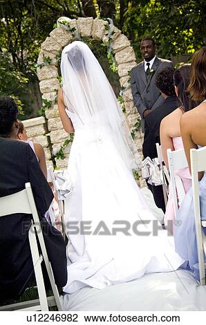 Bride walking down aisle View Large Photo Image Stock Image - Bride walking down aisle. Fotosearch