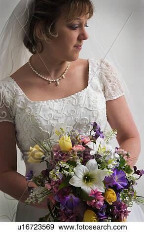Bride with bouquet View Large Photo Image Stock Photo - Bride with bouquet. Fotosearch