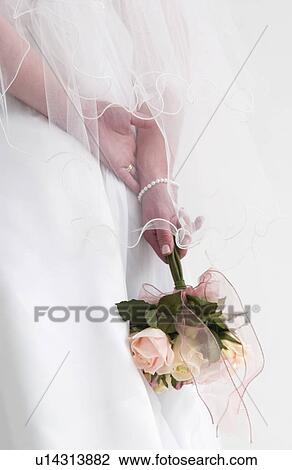 Bride with flowers View Large Photo Image Stock Image - Bride with flowers. Fotosearch