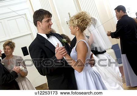 Bridesmaid and groomsman dancing View Large Photo Image Stock Image - Bridesmaid and groomsman dancing. Fotosearch