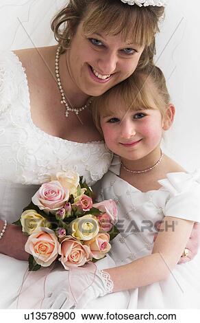 Stock Image - Flower girl and bride. Fotosearch