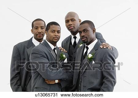 Stock Image - Groom with wedding party. Fotosearch