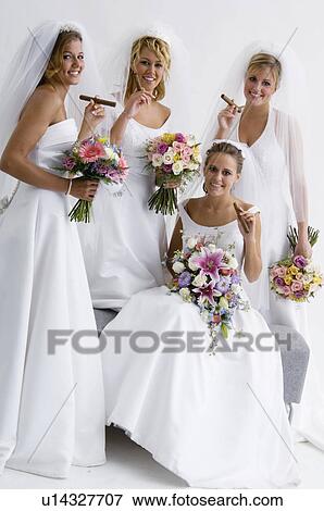 Group of brides with cigars View Large Photo Image Stock Photo - Group of brides with cigars. Fotosearch