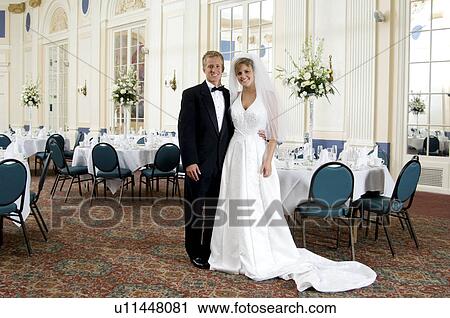 Bride and groom at reception View Large Photo Image Stock Image - Bride and groom at reception. Fotosearch