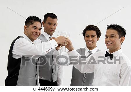Stock Photo - Groom and his bridal party toasting. Fotosearch