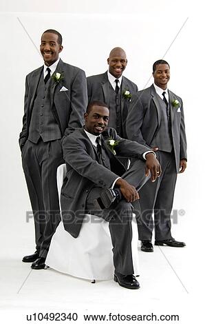 Stock Image - Groom with wedding party. Fotosearch