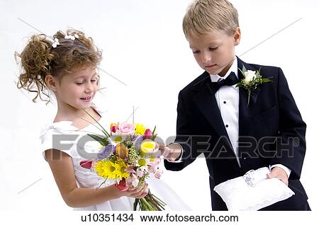 Ring bearer and flower girl View Large Photo Image Picture - Ring bearer and flower girl. Fotosearch