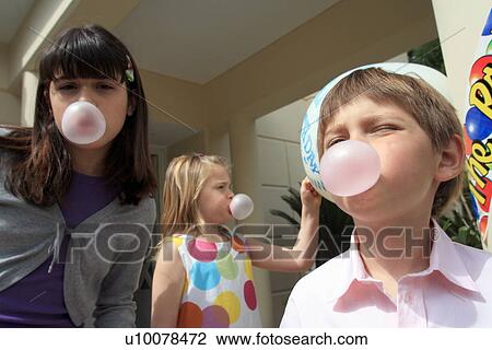 Children doing bubbles with gums View Large Photo Image Stock Image - Children doing bubbles with gums. Fotosearch
