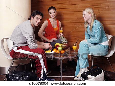 Picture - Friends having a refreshment after a spa treatment. Fotosearch