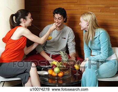 Friends having a refreshment after a spa treatment View Large Photo Image Stock Photo - Friends having a refreshment after a spa treatment. Fotosearch