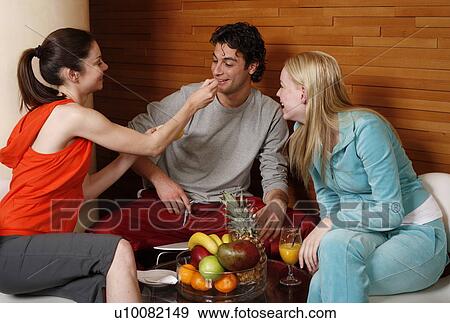 Friends having a refreshment after a spa treatment View Large Photo Image Stock Photo - Friends having a refreshment after a spa treatment. Fotosearch