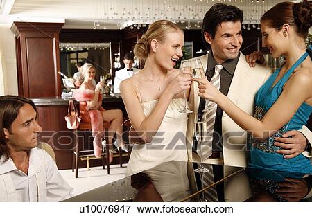 Group of people celebrating View Large Photo Image Stock Photo - Group of people celebrating . Fotosearch