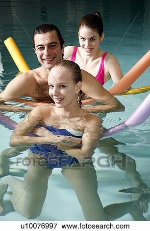 Stock Photo - People exercising in a spa pool. Fotosearch