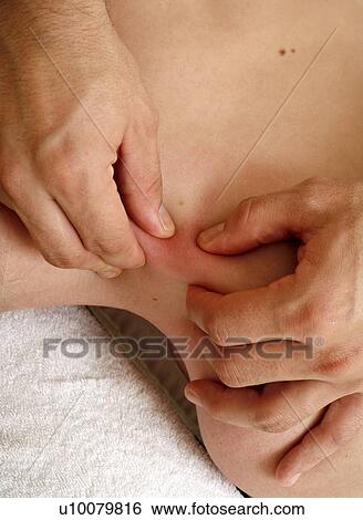 Back massage View Large Photo Image Stock Photograph - Back massage. Fotosearch