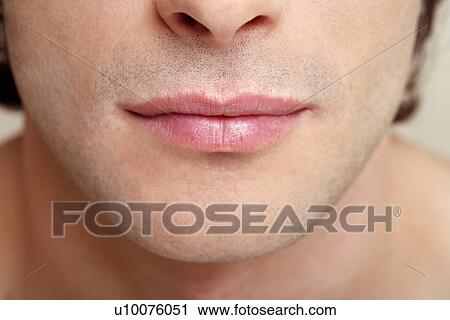 Stock Image - Beauty shot of man's lips. Fotosearch