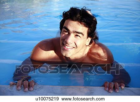 Stock Photo - Man in swimming pool. Fotosearch