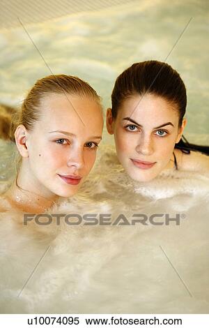 Two women in jacuzzi at a spa View Large Photo Image Stock Photography - Two women in jacuzzi at a spa. Fotosearch