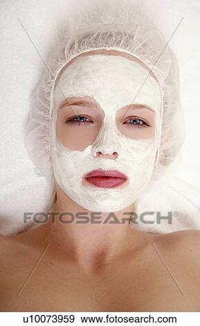 Woman having a facial treatment in a spa View Large Photo Image Stock Photo - Woman having a facial treatment in a spa. Fotosearch