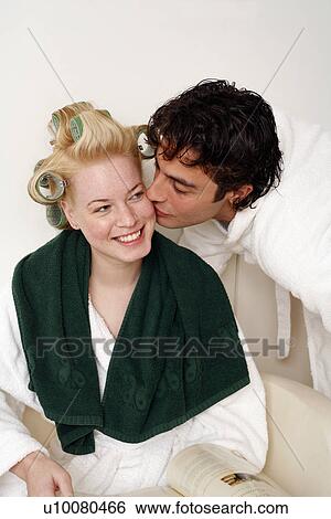 Young couple waiting in a beauty salon View Large Photo Image Stock Photograph - Young couple waiting in a beauty salon. Fotosearch