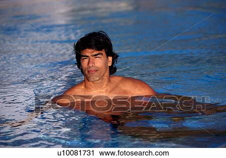 Man in swimming pool View Large Photo Image Stock Image - Man in swimming pool. Fotosearch