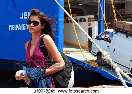 Young woman in front of ferry View Large Photo Image Stock Photography - Young woman in front of ferry. Fotosearch