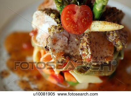 Stock Photography - Stylized vegetable tuna pasta plate. Fotosearch