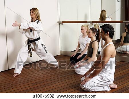 Students observing Tae Kwon Do - Dantae demonstration View Large Photo Image Stock Image - Students observing Tae Kwon Do - Dantae demonstration. Fotosearch