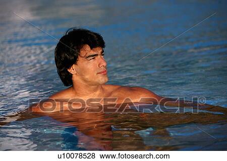 Man in swimming pool View Large Photo Image Stock Photo - Man in swimming pool. Fotosearch