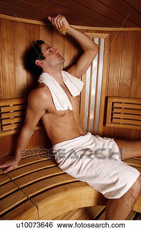 Stock Photograph - A man enjoying a sauna. Fotosearch