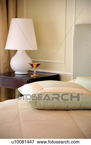 Bed and sidetable View Large Photo Image Stock Photo - Bed and sidetable. Fotosearch