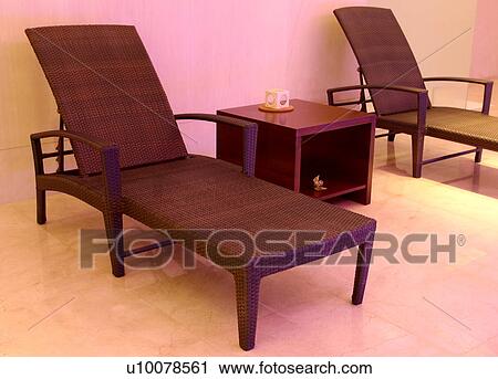 Stock Image - Chaise lounges in a waiting room. Fotosearch