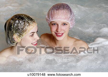 Two women in jacuzzi at a spa View Large Photo Image Stock Photo - Two women in jacuzzi at a spa. Fotosearch