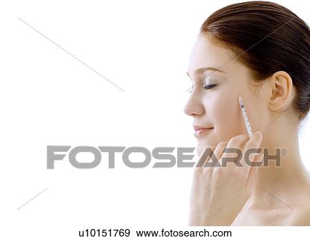 Stock Photo - Beauty Treatment, One Person, Young Adult, Adults Only. Fotosearch