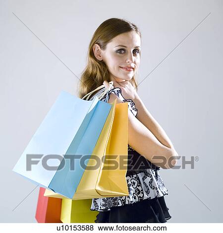 Stock Photo - Fashion? Shopping, Looking At Camera, Square, One Person. Fotosearch