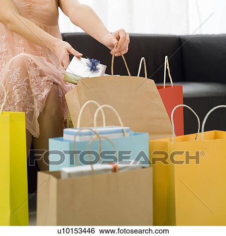 Fashion? Shopping, One Person, Young Adult, Adults Only View Large Photo Image Stock Photograph - Fashion? Shopping, One Person, Young Adult, Adults Only. Fotosearch