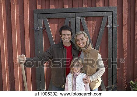 Family stand beside barn, at organic farm, Ladner, British Columbia, Canada View Large Photo Image Stock Image - Family stand beside barn, at organic farm, Ladner, British Columbia, Canada. Fotosearch