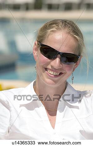 Woman (35) relaxing poolside, Jacksonville, Florida View Large Photo Image Stock Image - Woman (35) relaxing poolside, Jacksonville, Florida. Fotosearch