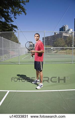 Young Man ready to serve on tennis court, Vancouver, British Columbia View Large Photo Image Stock Image - Young Man ready to serve on tennis court, Vancouver, British Columbia. Fotosearch