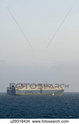 Picture - Container ship, Strait of Juan de Fuca of Victoria, BC, Canada. Fotosearch