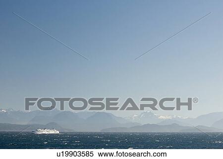 Ferry boat makes a crossing in rough seas with mountains in the background, BC Ferries, Nanaimo, BC, Canada View Large Photo Image Stock Photography - Ferry boat makes a crossing in rough seas with mountains in the background, BC Ferries, Nanaimo, BC, Canada. Fotosearch