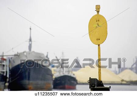 Train track switch stand with soft focus industrial setting in background View Large Photo Image Stock Photo - Train track switch stand with soft focus industrial setting in background. Fotosearch