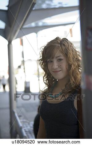 Female, 17, waits at bus stop, Broadway St. Vancouver, BC View Large Photo Image Stock Image - Female, 17, waits at bus stop, Broadway St. Vancouver, BC. Fotosearch