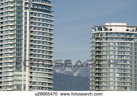 Stock Image - Skyscrapers occupy the Vancouver skyline. Housing prices are at an all-time high. Fotosearch
