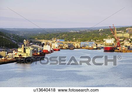 View of ship and harbour at sunrise, St. John's, Newfoundland, Canada View Large Photo Image Stock Photo - View of ship and harbour at sunrise, St. John's, Newfoundland, Canada. Fotosearch