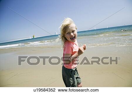 5 year old girl playing at a beach, Santa Barbara California View Large Photo Image Stock Image - 5 year old girl playing at a beach, Santa Barbara California. Fotosearch