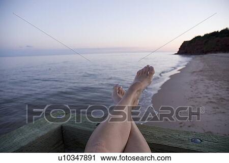 Crossed bare feet, near Basin Head, Prince Edward Island View Large Photo Image Stock Image - Crossed bare feet, near Basin Head, Prince Edward Island. Fotosearch